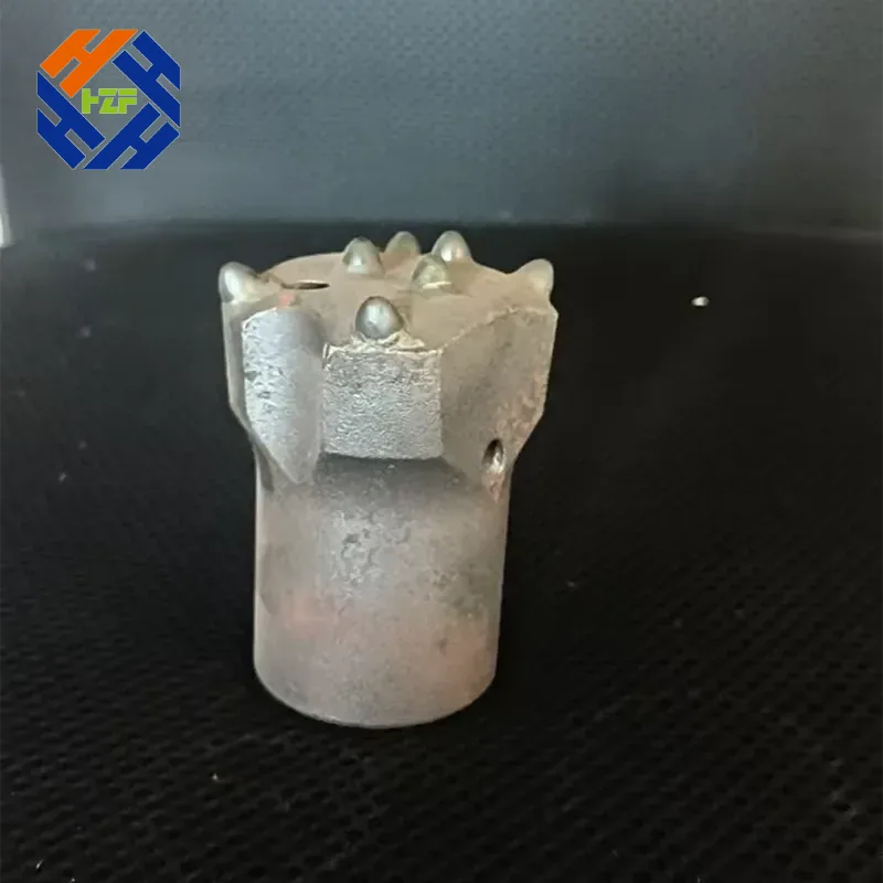 Punta a bottone per perforazione di roccia